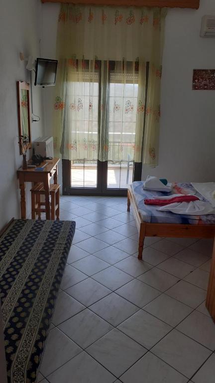 Postel nebo postele na pokoji v ubytování Giola aparments and studios 2