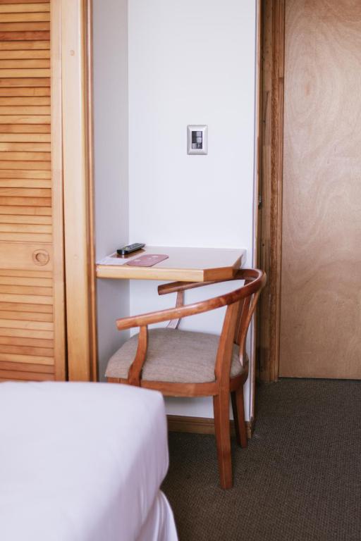 Postel nebo postele na pokoji v ubytování Hotel Germania