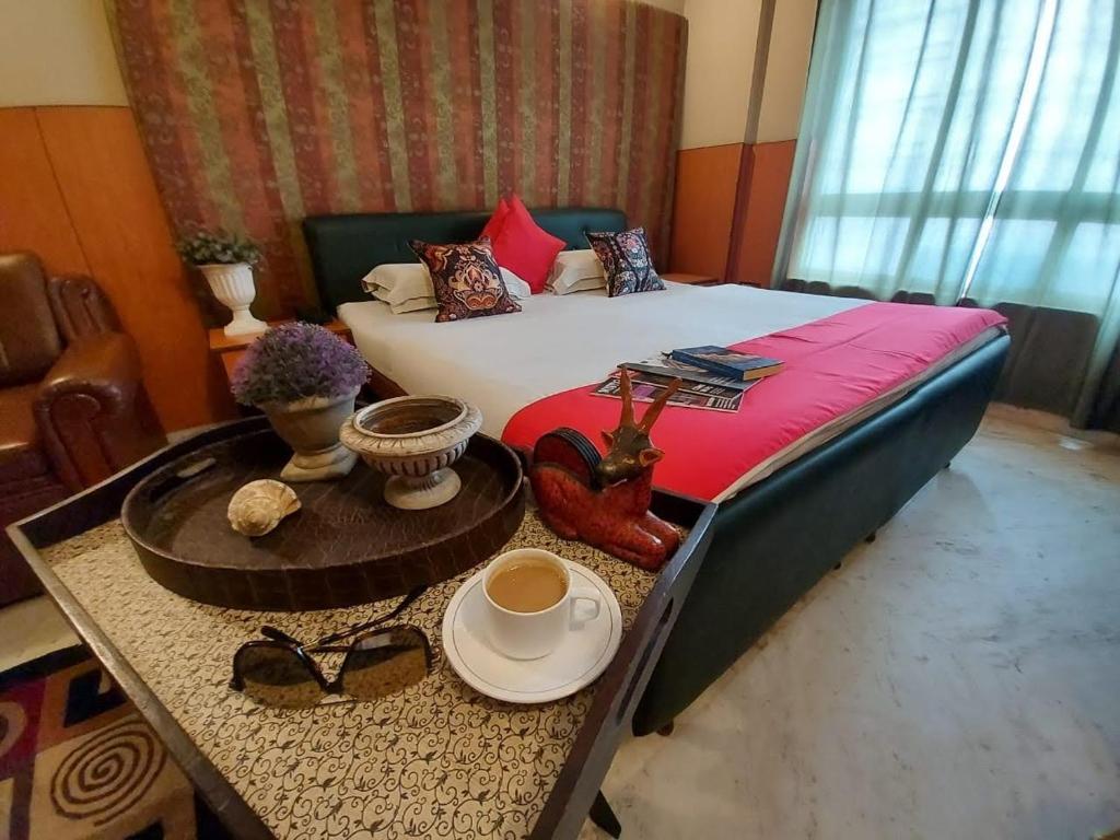 Postel nebo postele na pokoji v ubytování Malik Guest House