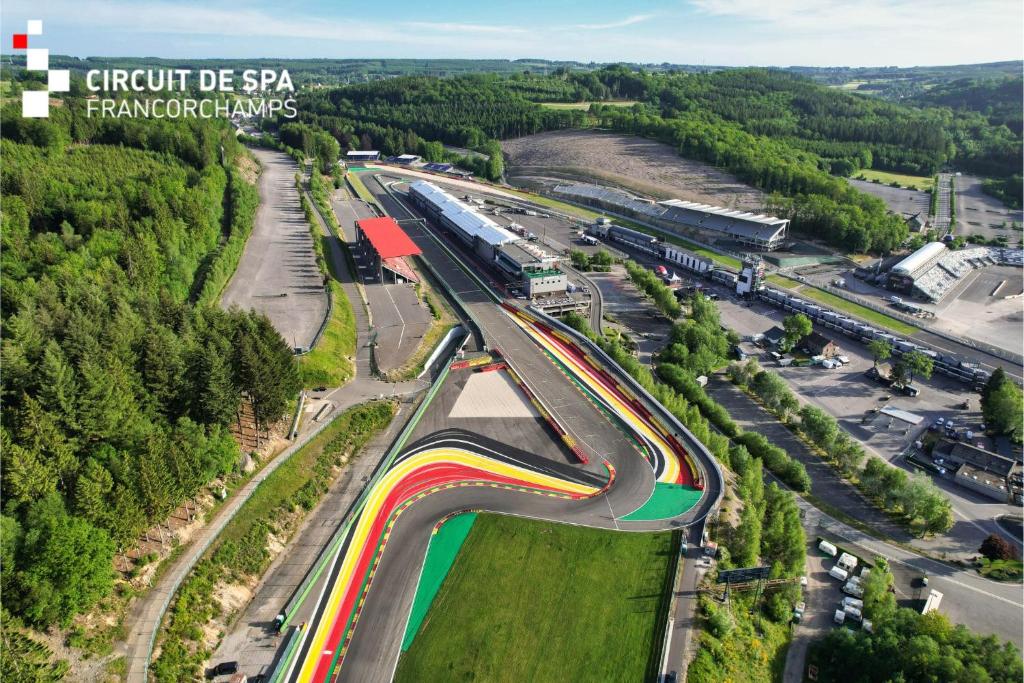 an overhead view of a train track with a train station at Domaine Long Pre in Stavelot
