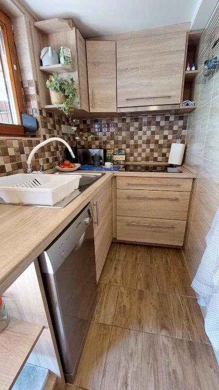 Köök või kööginurk majutusasutuses Újhegy Apartman