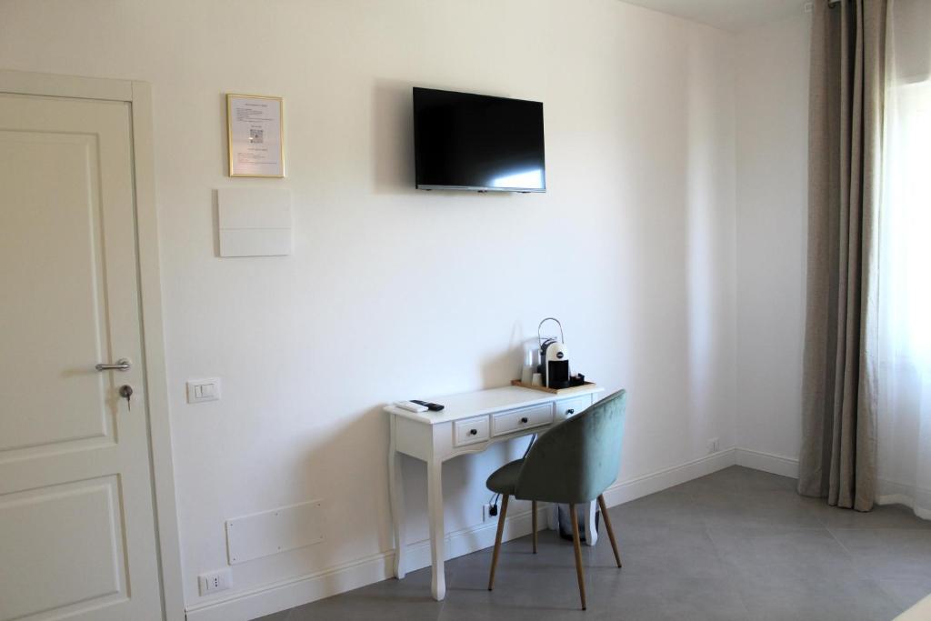TV a/nebo společenská místnost v ubytování Villa Forte Salvi - Rooms