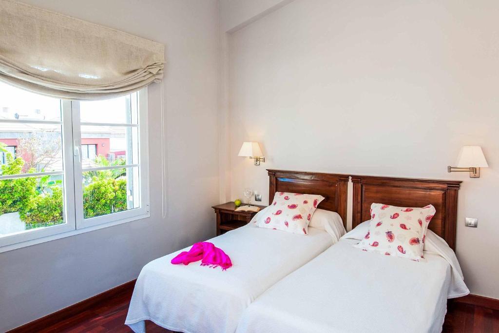 Postel nebo postele na pokoji v ubytování Villa Meloneras Hills 16