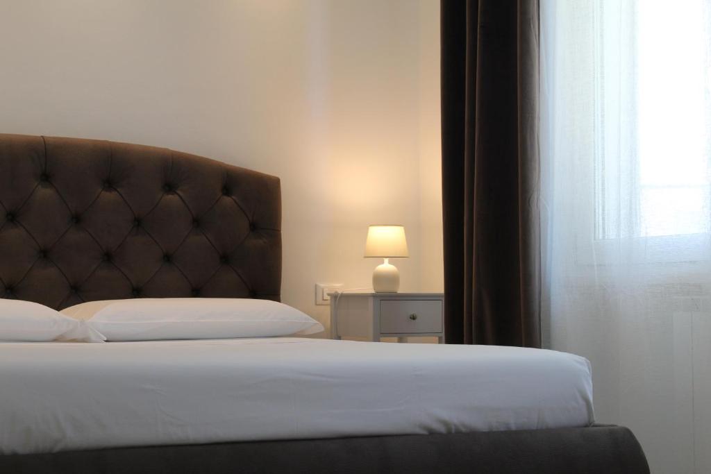 Postel nebo postele na pokoji v ubytování Villa Forte Salvi - Rooms