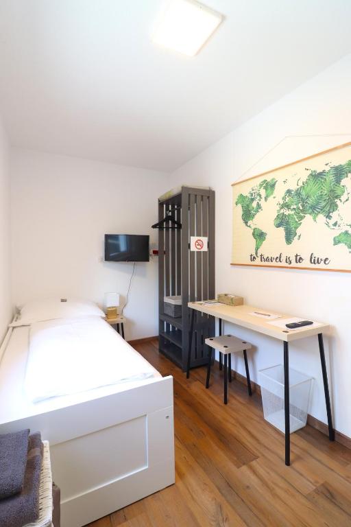 Postel nebo postele na pokoji v ubytování Montfort Apartments - Feldkirch