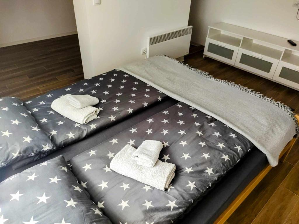 Postel nebo postele na pokoji v ubytování Studio Bajka