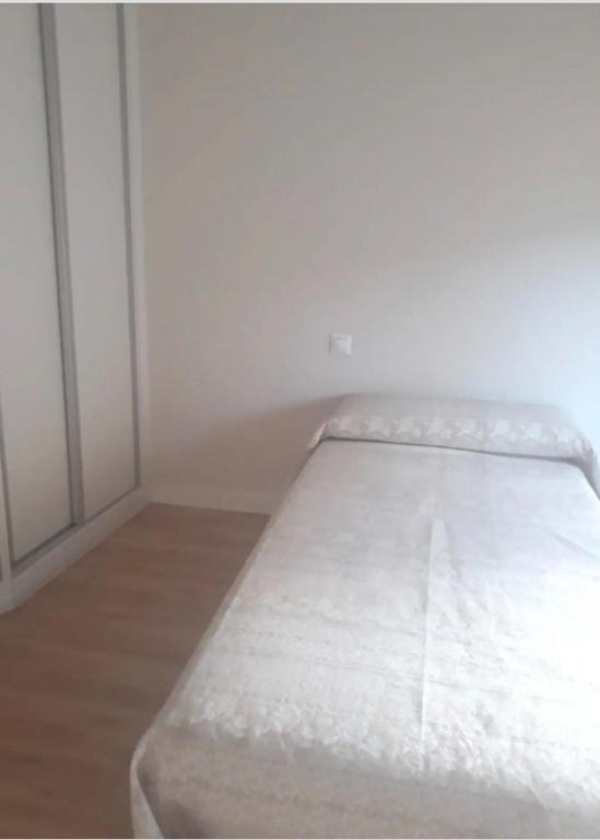 A bed or beds in a room at Apartamento Nuevo Duplex
