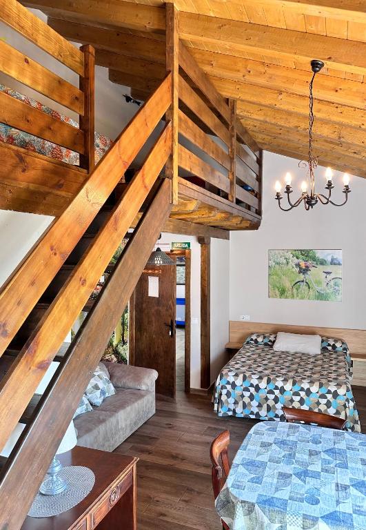 Postel nebo postele na pokoji v ubytování Apartamentos Rurales Sobremazas