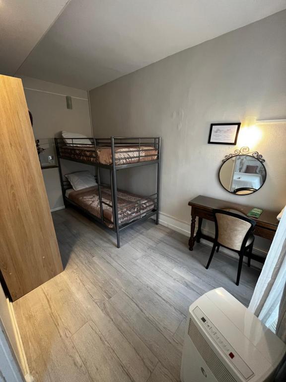 Postel nebo postele na pokoji v ubytování Hôtel Marie Louise