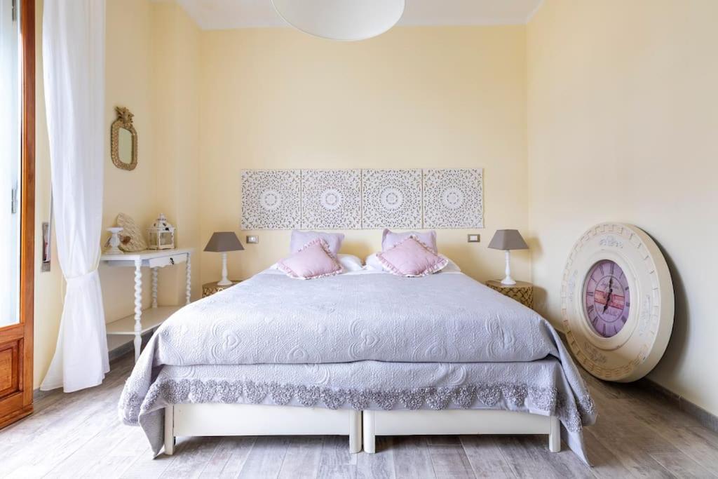 Postel nebo postele na pokoji v ubytování Annali Casa vacanze - Shabby style nella natura