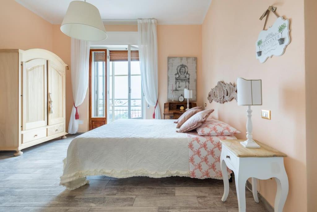 Postel nebo postele na pokoji v ubytování Annali Casa vacanze - Shabby style nella natura