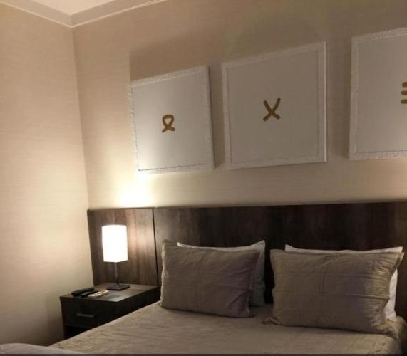 Postel nebo postele na pokoji v ubytování Hotel Paulista Plaza MCR