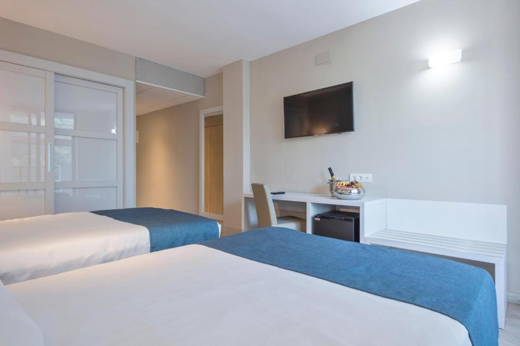 Postel nebo postele na pokoji v ubytování Hotel Best Sol D´Or