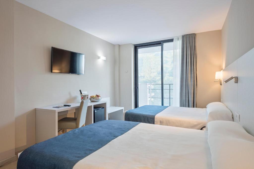 Postel nebo postele na pokoji v ubytování Hotel Best Sol D´Or