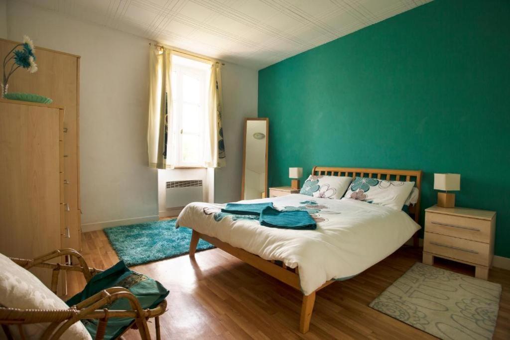 Ένα ή περισσότερα κρεβάτια σε δωμάτιο στο Gites La butte de l'espérance