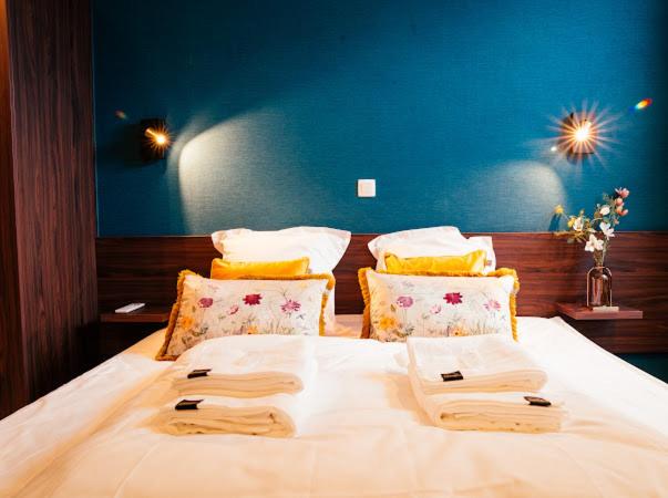 Postel nebo postele na pokoji v ubytování Gran Hotel De Passage