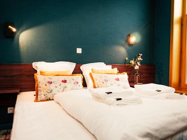 Postel nebo postele na pokoji v ubytování Gran Hotel De Passage