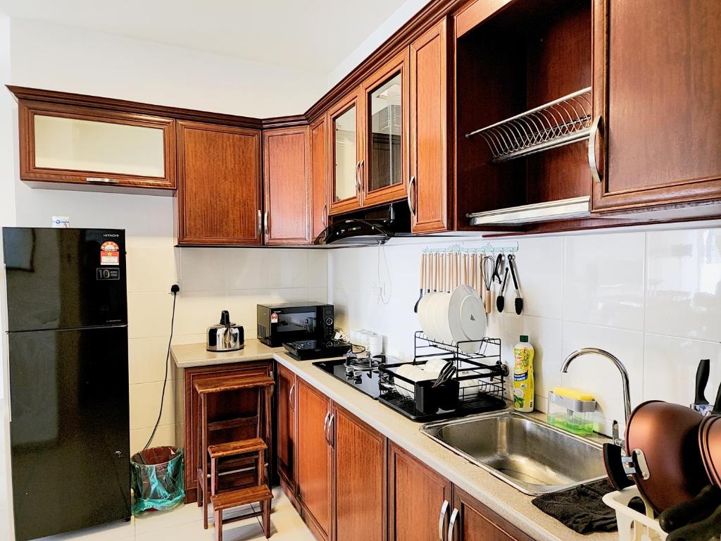 Kuchyň nebo kuchyňský kout v ubytování Dwiputra Residence Presint 15 PutraJAYA