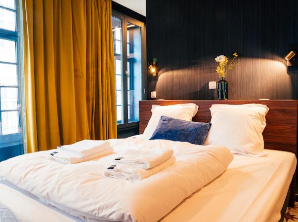 Postel nebo postele na pokoji v ubytování Gran Hotel De Passage