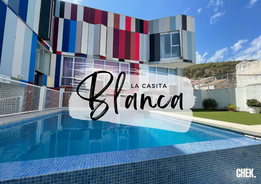 a villa with a swimming pool in sierra blanca at LA CASITA BLANCA by chëk in Jaén
