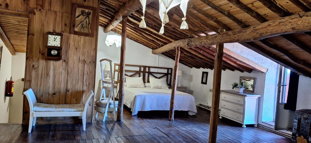 Postel nebo postele na pokoji v ubytování Casa Obdulia