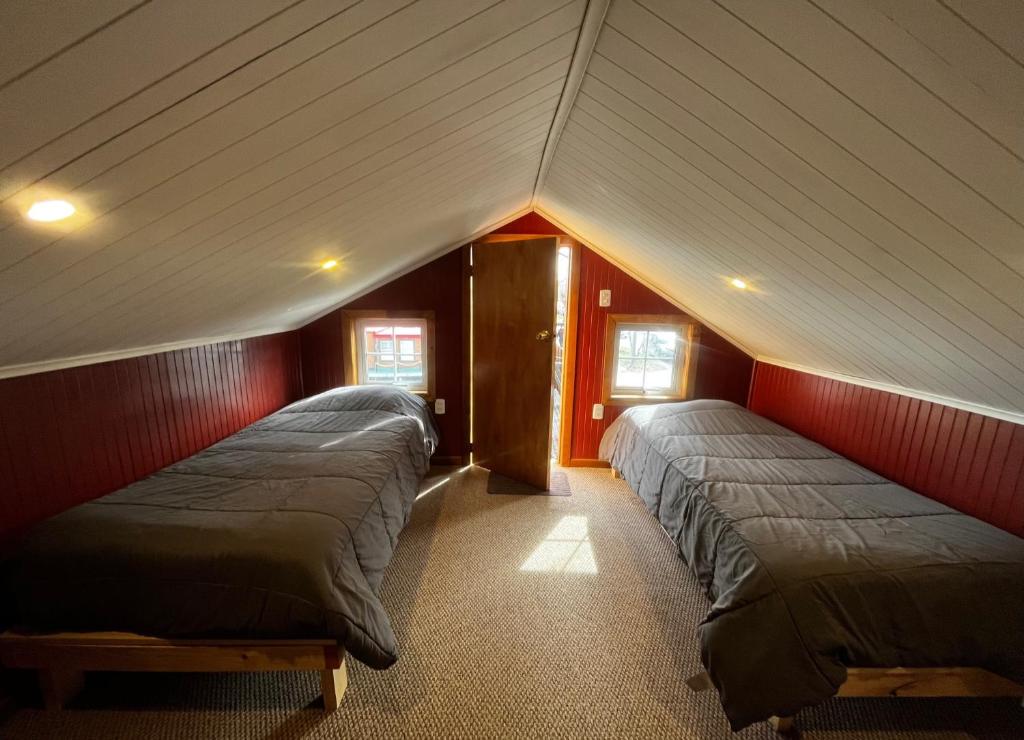Postel nebo postele na pokoji v ubytování Corner Hostel Puerto Natales