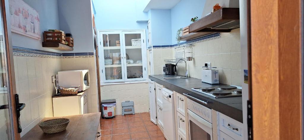 Kuchyň nebo kuchyňský kout v ubytování Casa Obdulia
