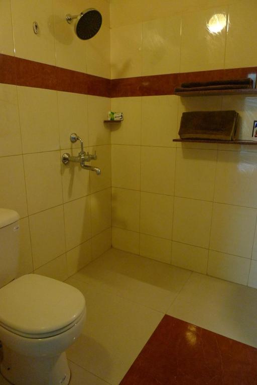 Koupelna v ubytování The Kei Suites