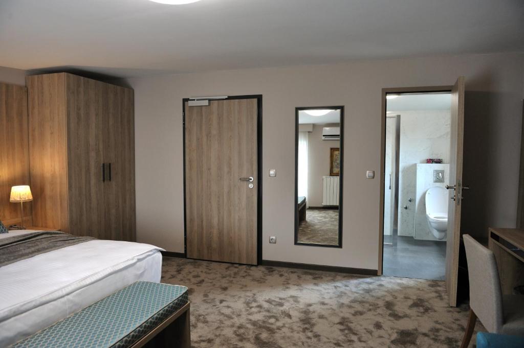 Postel nebo postele na pokoji v ubytování Hotel VIP