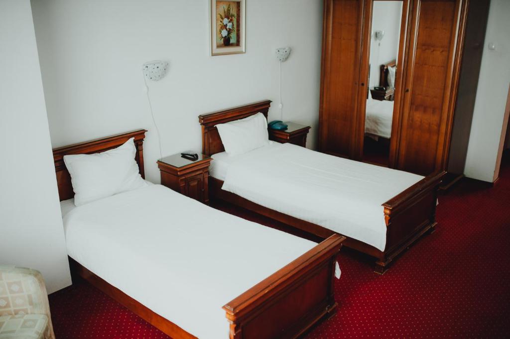 Postel nebo postele na pokoji v ubytování Hotel Bavaria