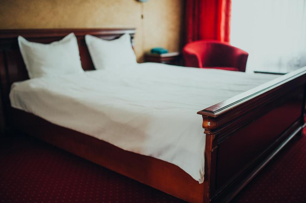 Postel nebo postele na pokoji v ubytování Hotel Bavaria