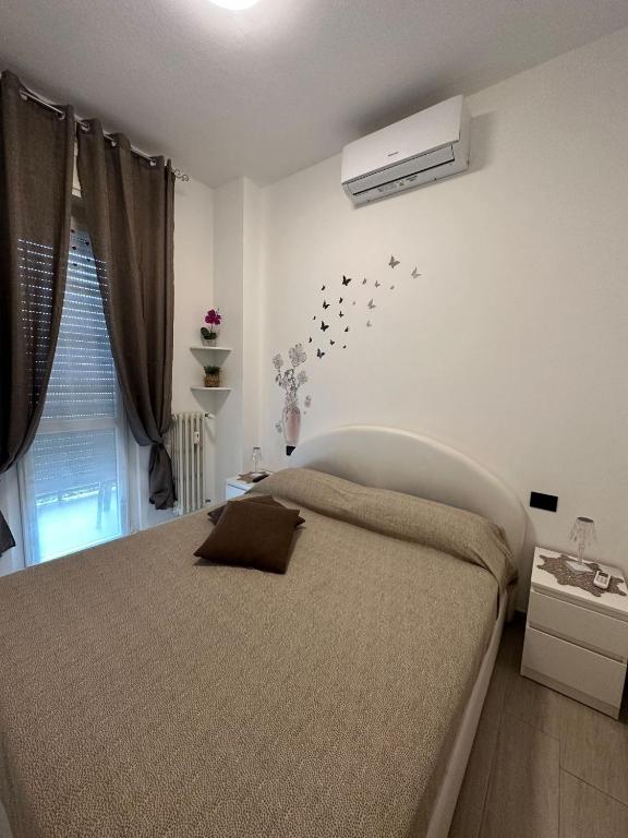 Postel nebo postele na pokoji v ubytování Alice sweet home
