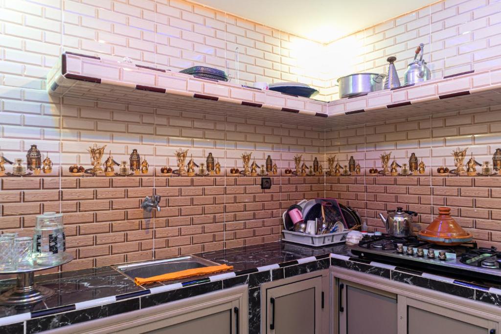 Kuchyň nebo kuchyňský kout v ubytování ADAM APPARTEMENTS
