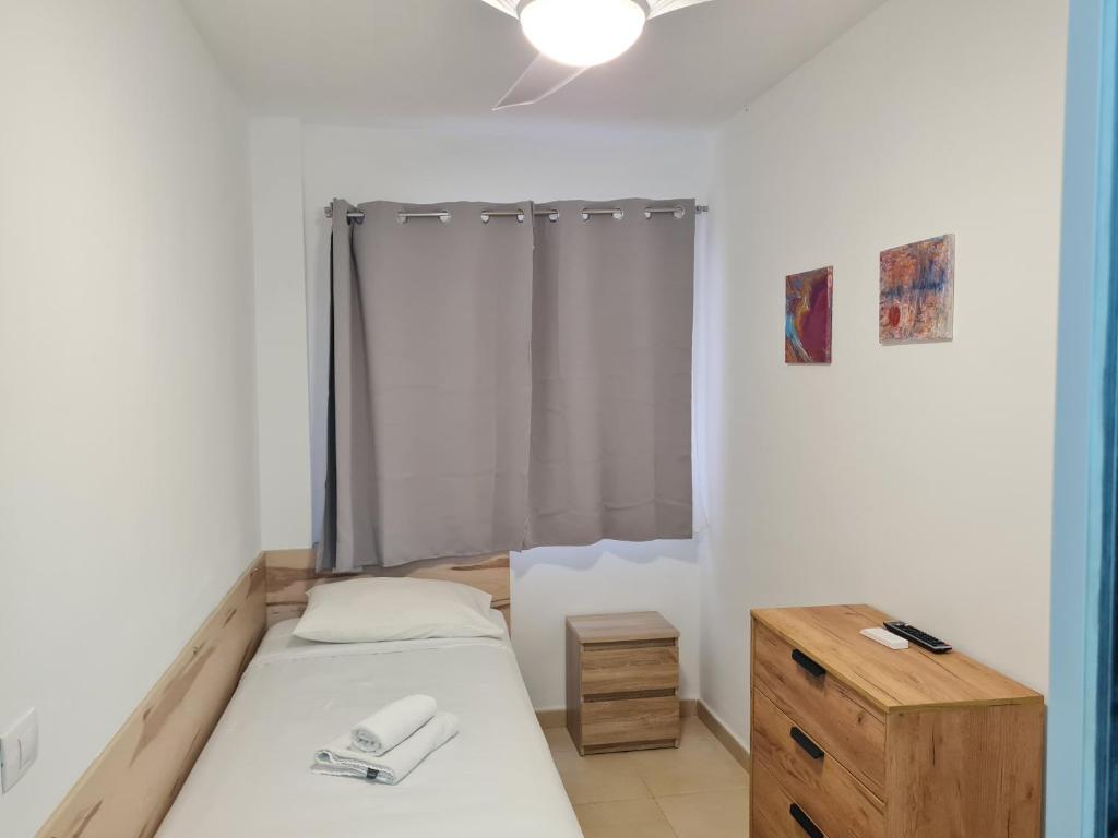 Posteľ alebo postele v izbe v ubytovaní Casa Natalia