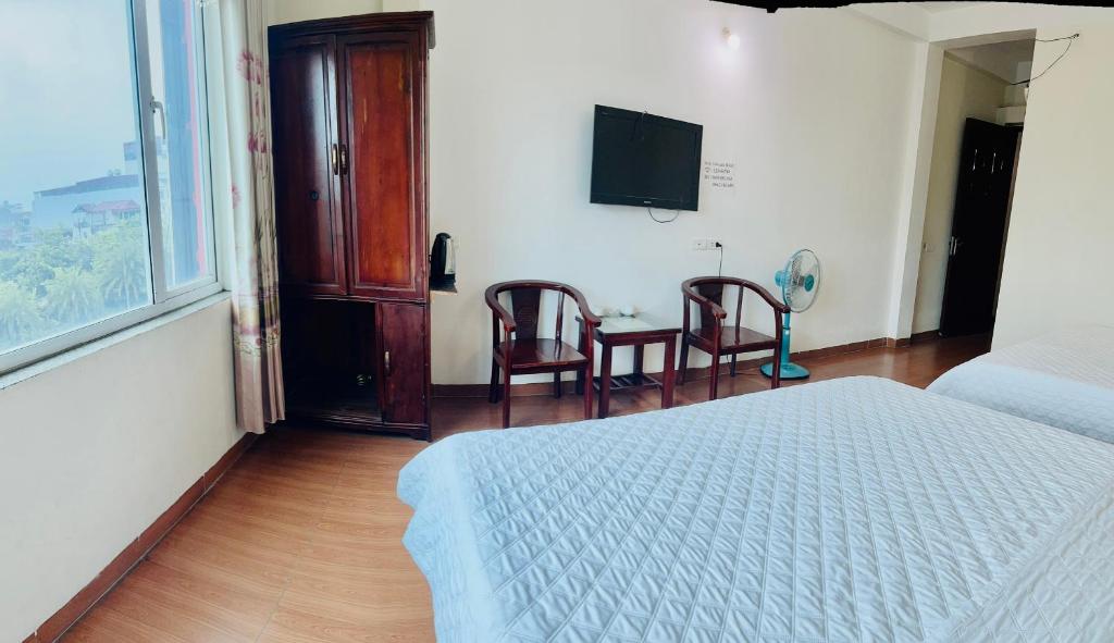 TV a/nebo společenská místnost v ubytování Van Anh Hotel