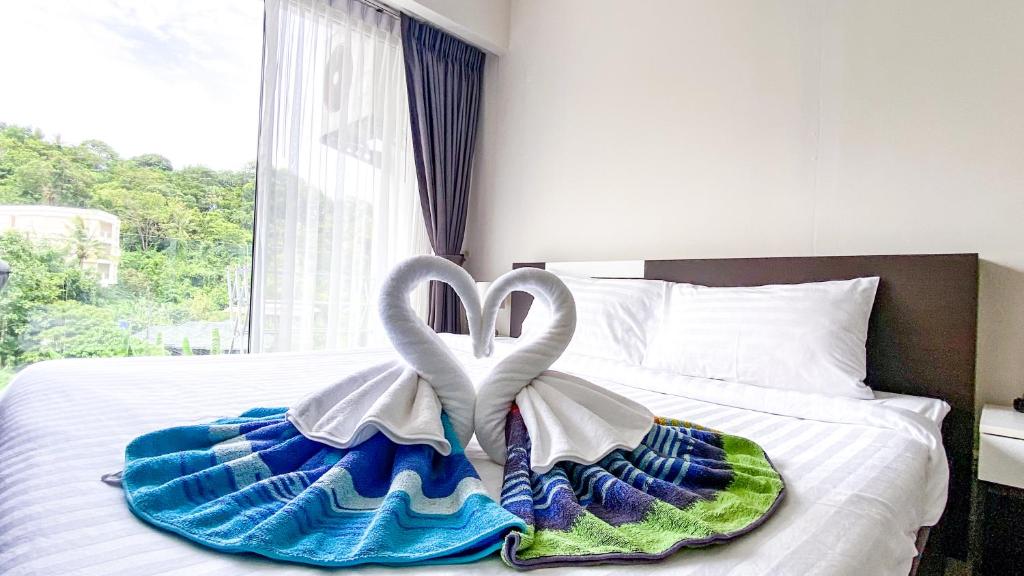 Postel nebo postele na pokoji v ubytování Studio near Karon Beach by Clavis