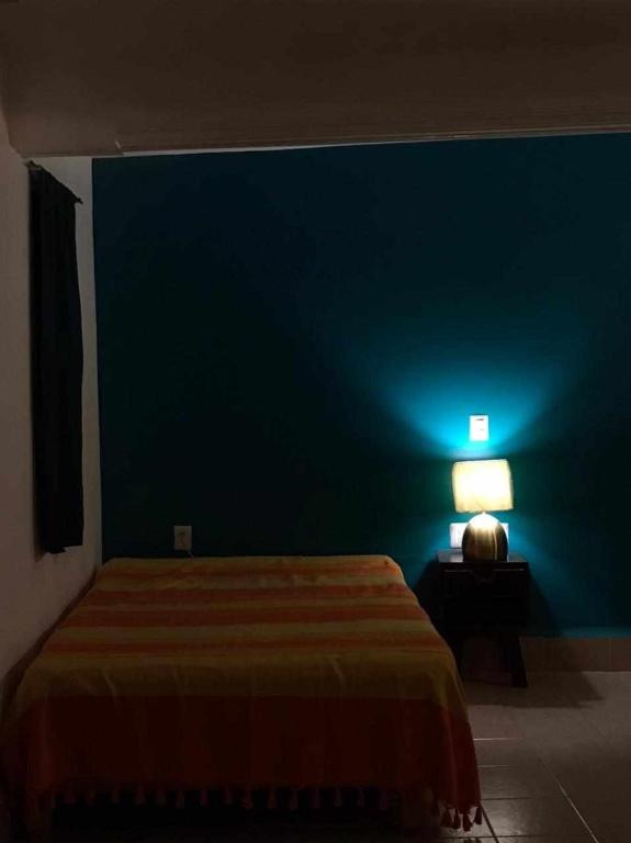 Letto o letti in una camera di San Fernando Hostal