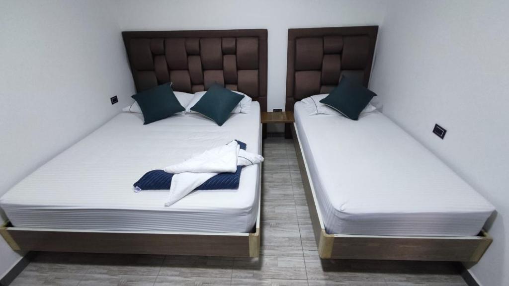 Postel nebo postele na pokoji v ubytování Hostel Boutique Nido de Loros