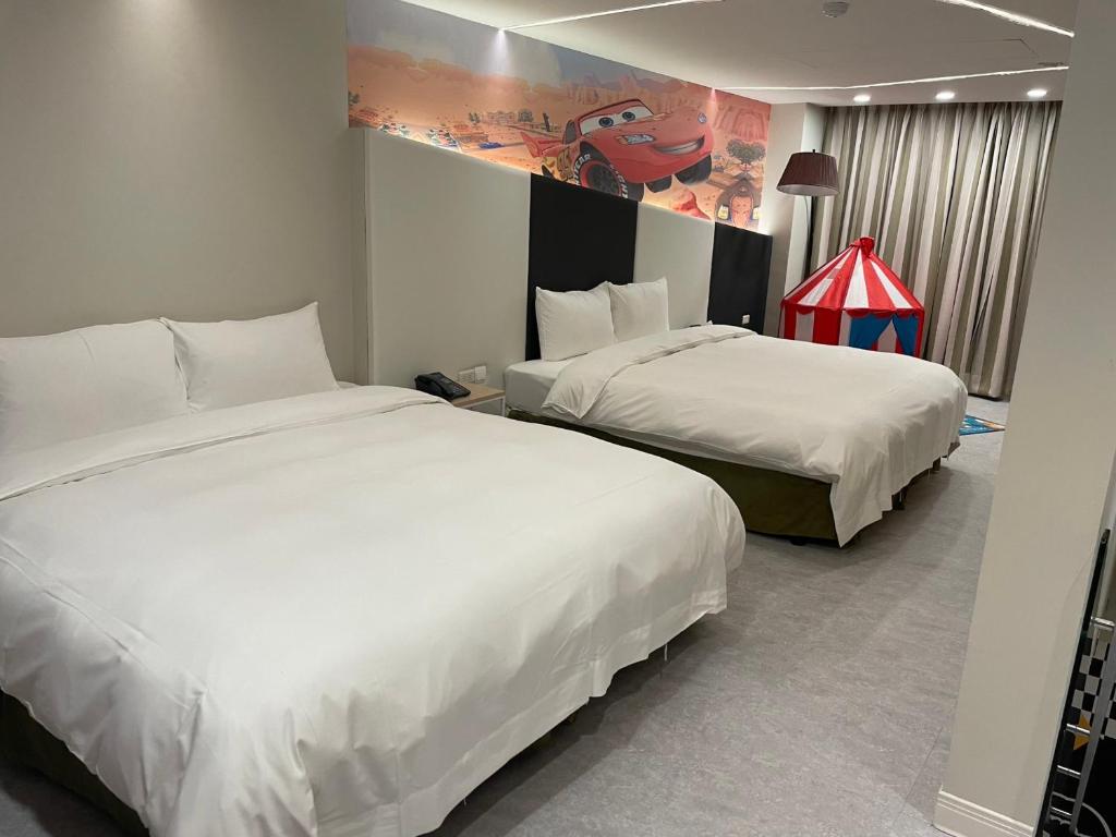 Postel nebo postele na pokoji v ubytování Ya Nold Hot Spring Hotel