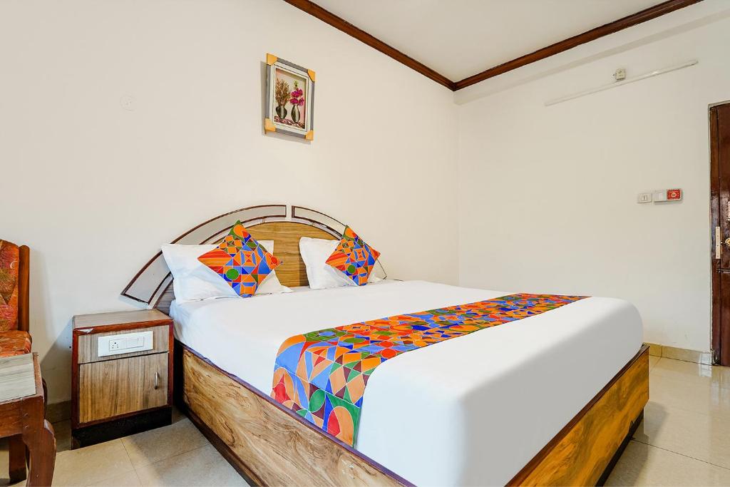 Postel nebo postele na pokoji v ubytování Hotel Orchid Inn