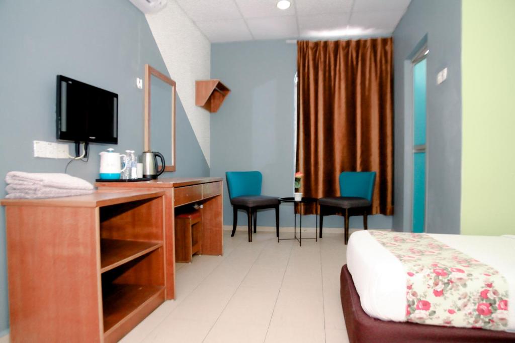 TV a/nebo společenská místnost v ubytování HOTEL D VIEW MERSING