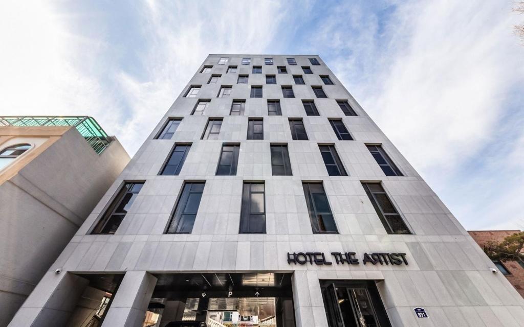 a tall building with the words hotel the arts at Hotel The Artist Yeonsinnae in Seoul