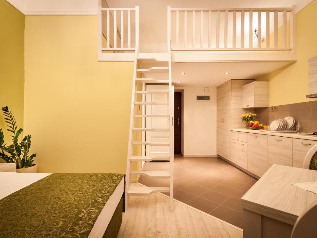 Kuchyň nebo kuchyňský kout v ubytování Apartamenty Bonerowska 5