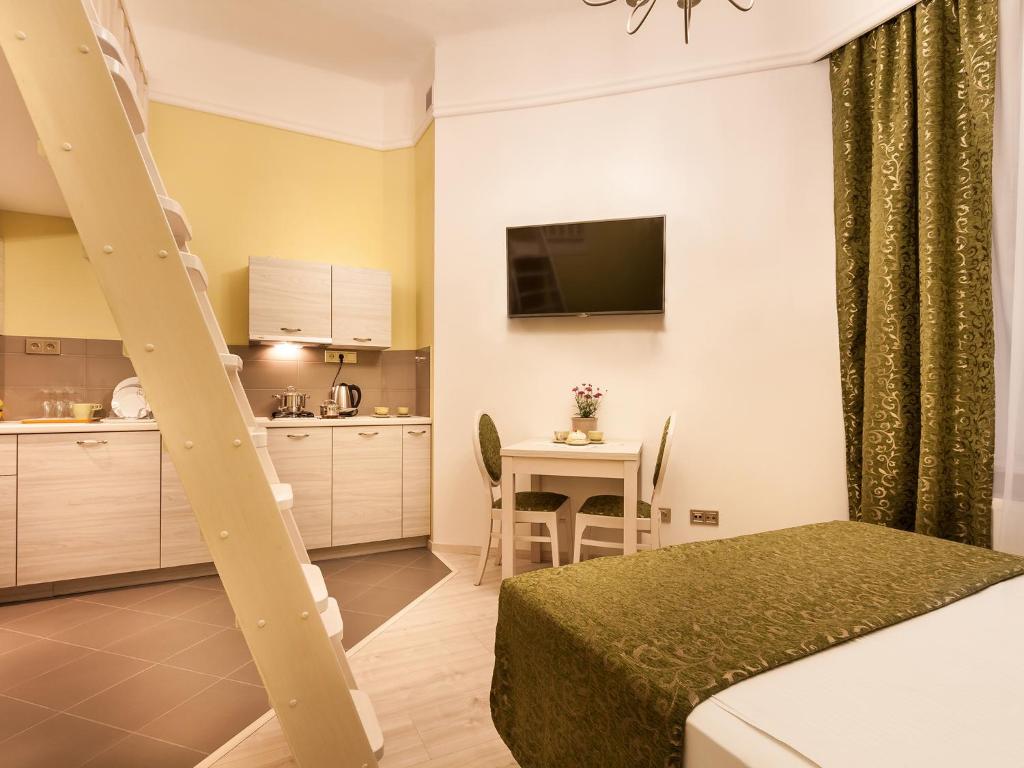 Kuchyň nebo kuchyňský kout v ubytování Apartamenty Bonerowska 5