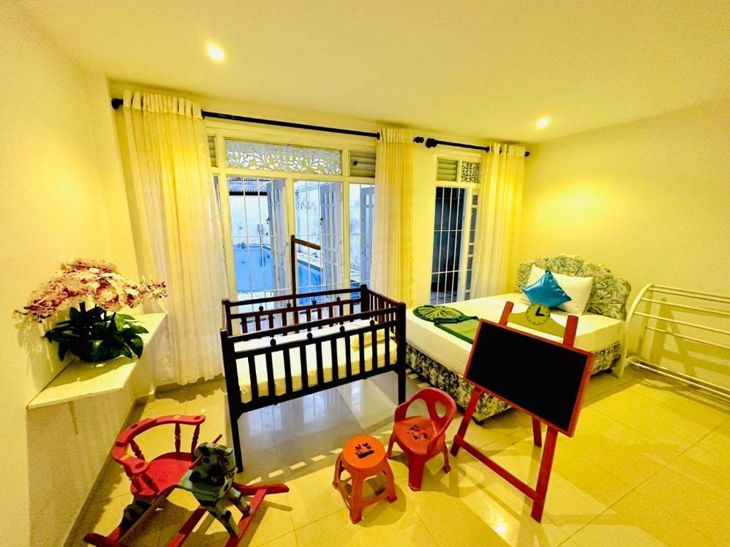 Sunset Sands - Dreibettzimmer Mit Poolblick