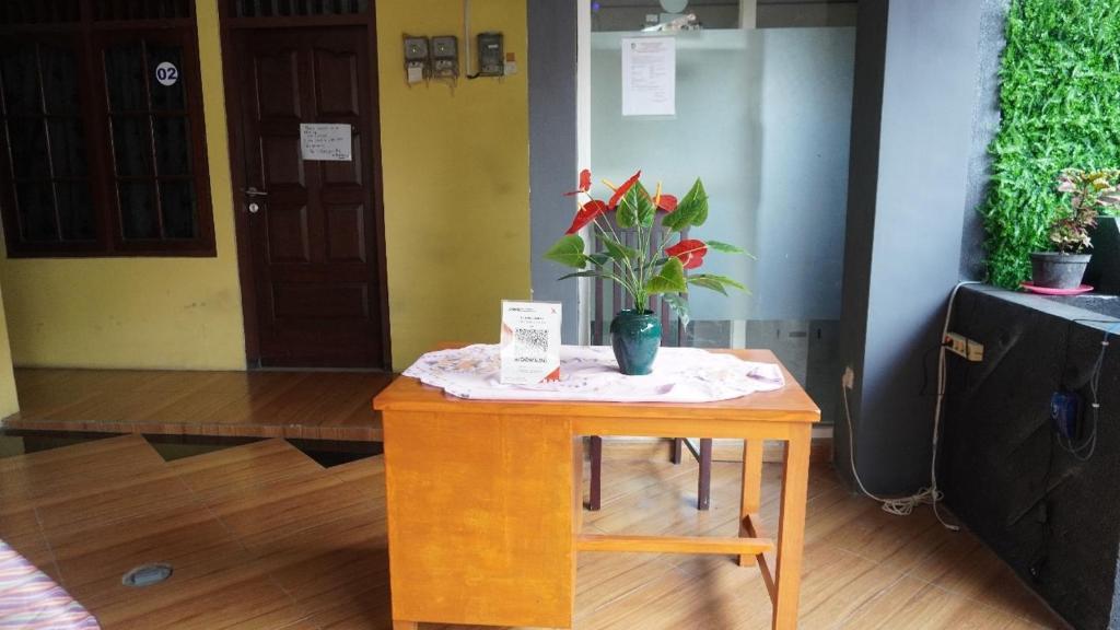 TV a/nebo společenská místnost v ubytování Nadyah Syariah Homestay