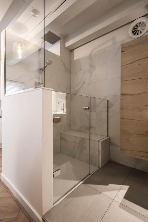 Koupelna v ubytování Le Bon'Apart Suites
