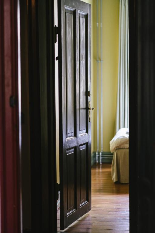 Postel nebo postele na pokoji v ubytování Rye115 Hotel