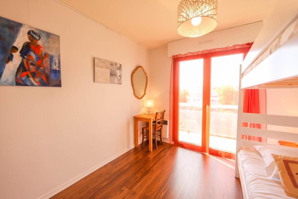 Posteľ alebo postele v izbe v ubytovaní La Pause annécienne appartement familial