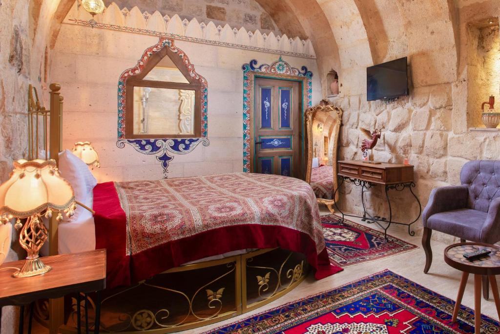 TV a/nebo společenská místnost v ubytování Carna Cave Hotel Cappadocia